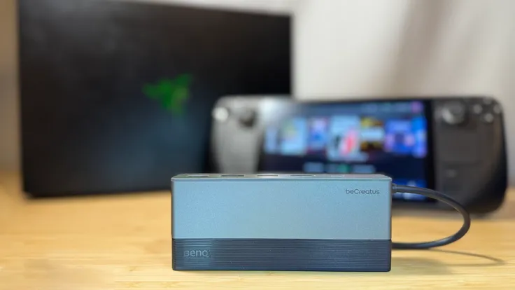 BenQ beCreatus GR10 dock in front of a Steam Deck and Razer Blade 14" gaming laptop.
